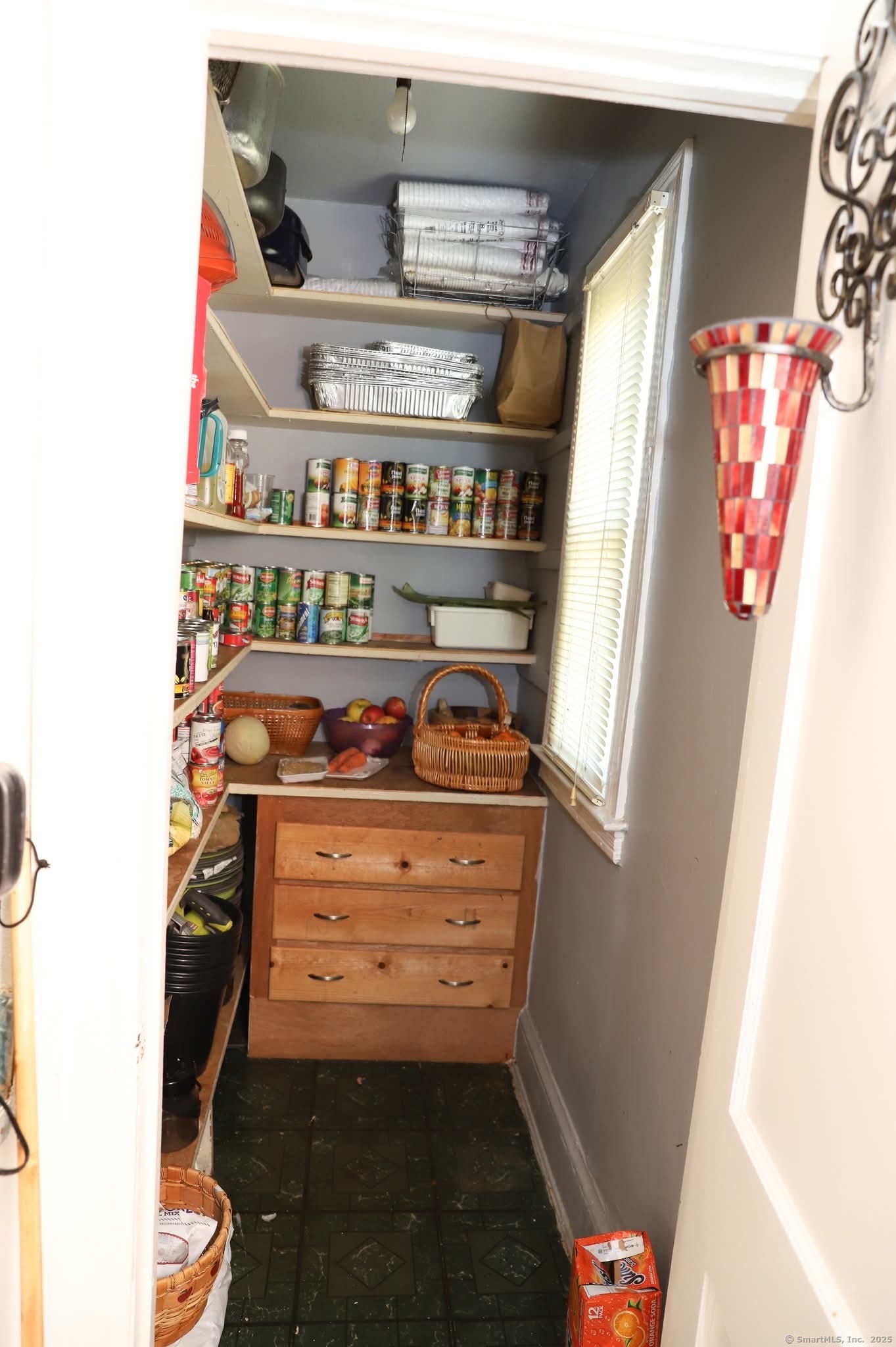 11 Pershing Street Hartford, CT 06112 - Photo 18 of 37 a close view of water heater and cabinet