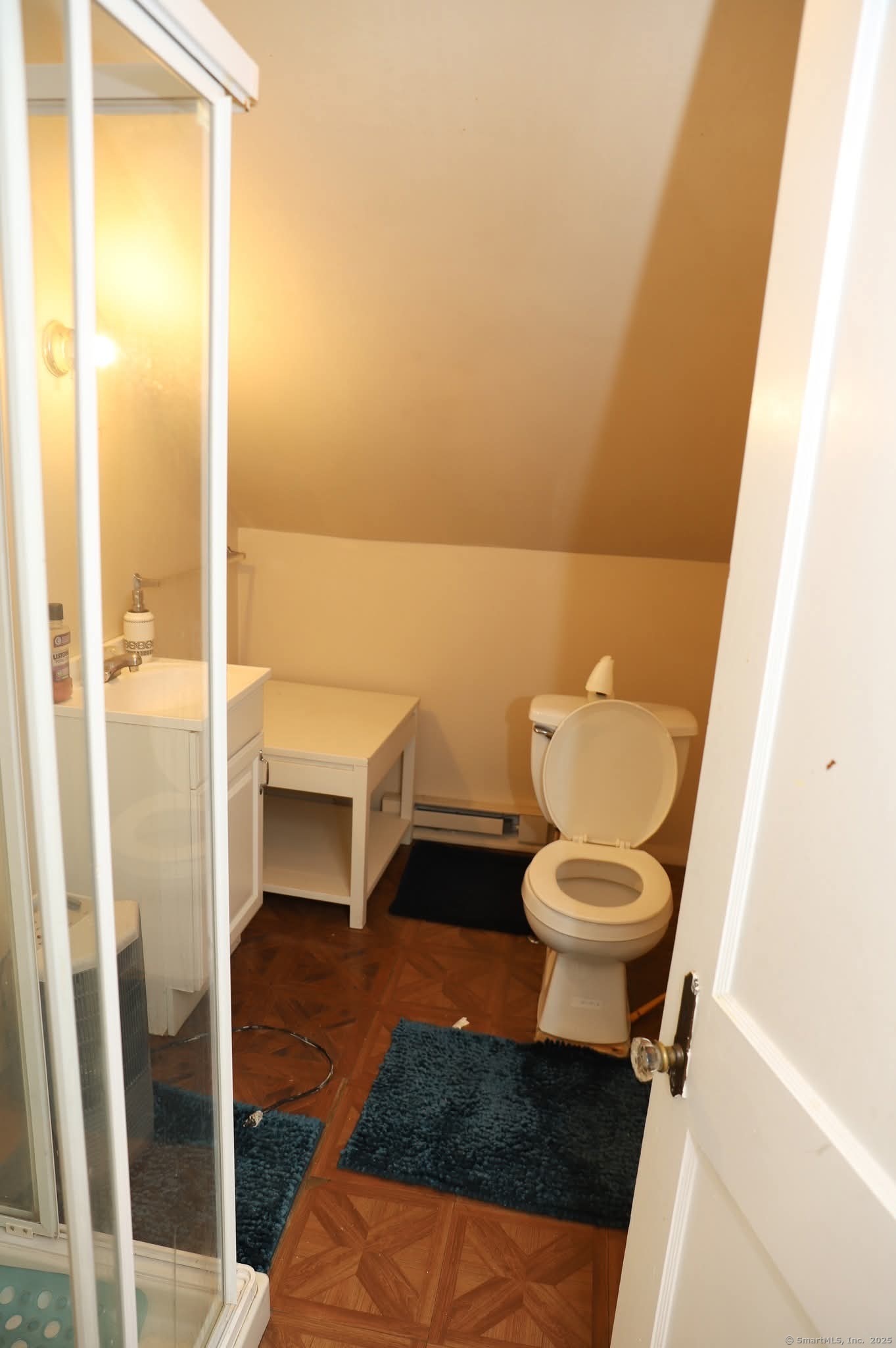 11 Pershing Street Hartford, CT 06112 - Photo 20 of 37 a bathroom with a toilet and a shower