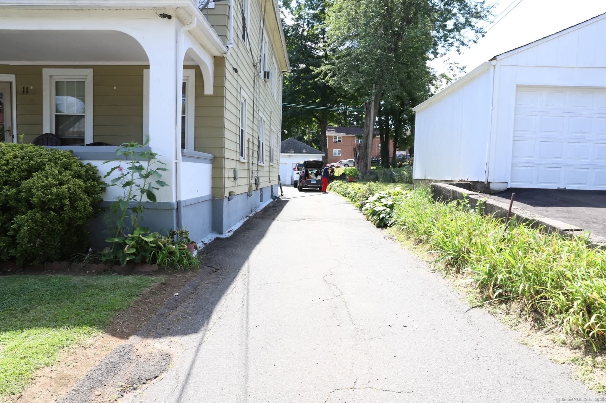 11 Pershing Street Hartford, CT 06112 - Photo 2 of 37 a view of a house with backyard