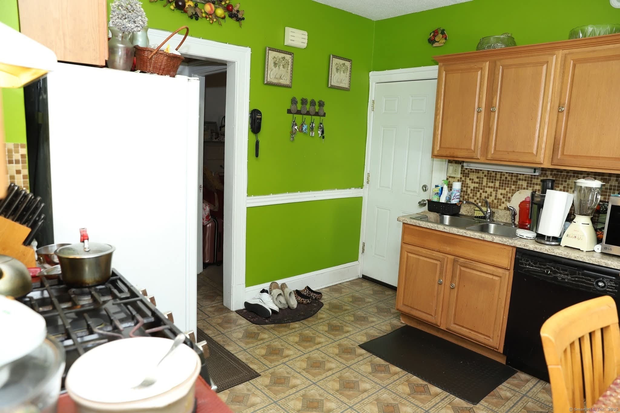 11 Pershing Street Hartford, CT 06112 - Photo 27 of 37 a bathroom with a sink toilet and mirror