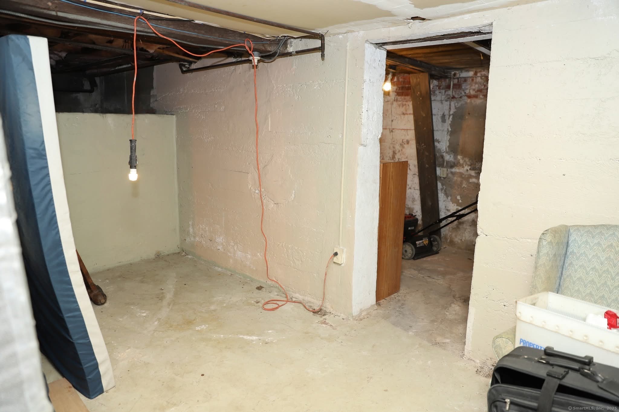 11 Pershing Street Hartford, CT 06112 - Photo 29 of 37 a view of walk in closet with clothes and shoes