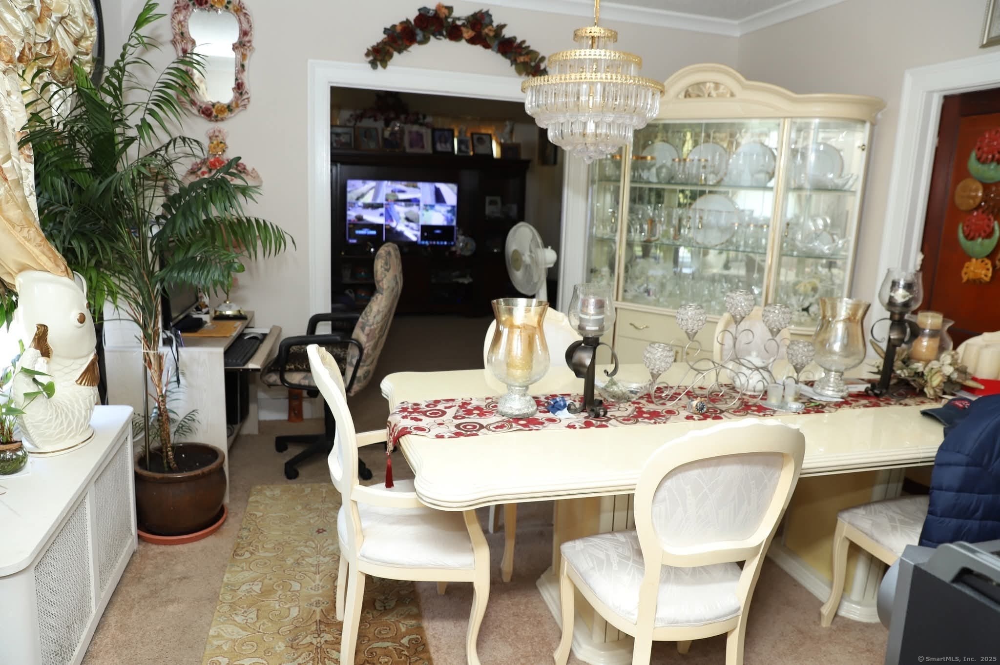 11 Pershing Street Hartford, CT 06112 - Photo 36 of 37 a dining room with furniture a chandelier and window