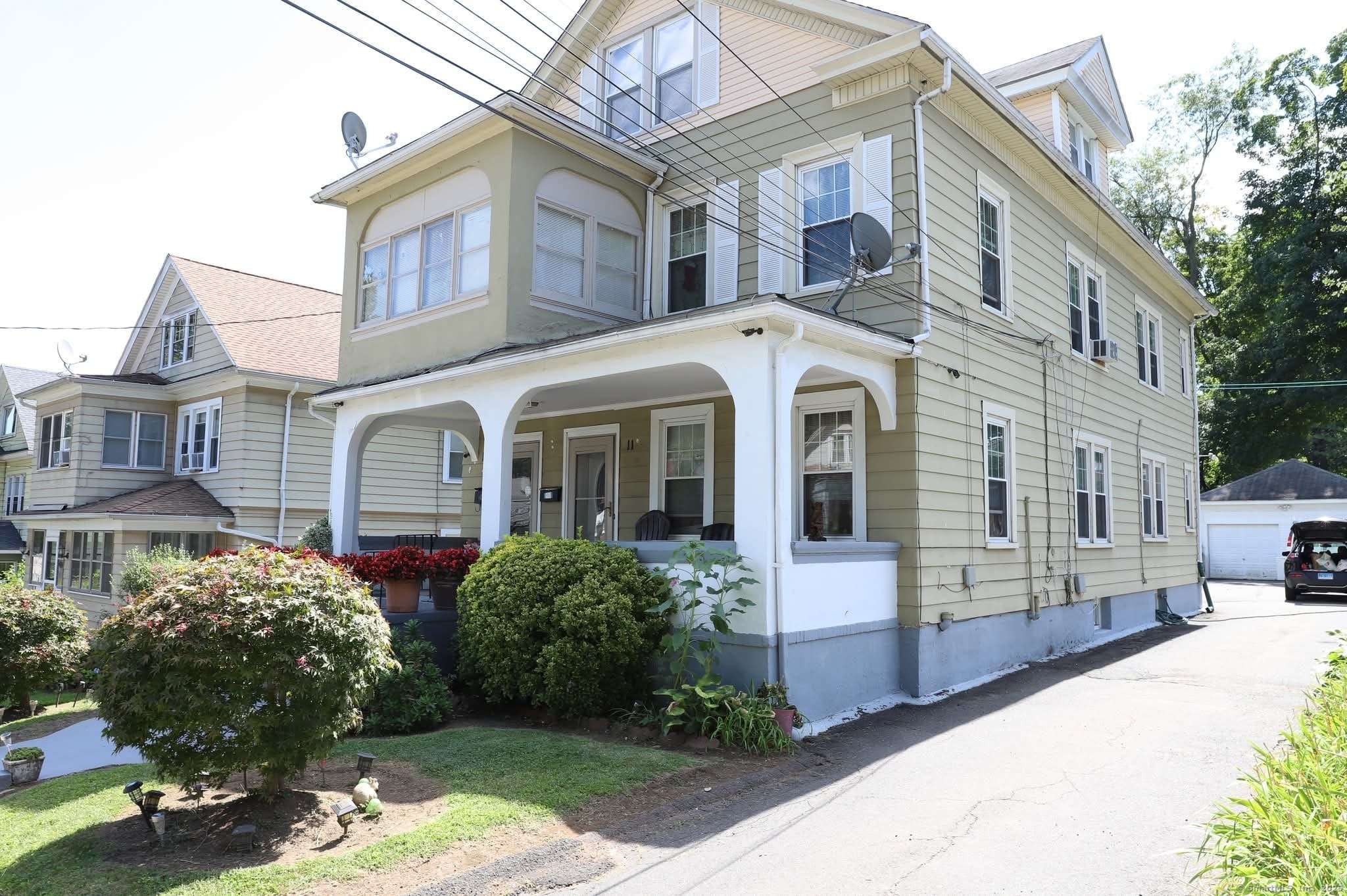 11 Pershing Street Hartford, CT 06112 - Photo 37 of 37 a front view of a multi story residential apartment building