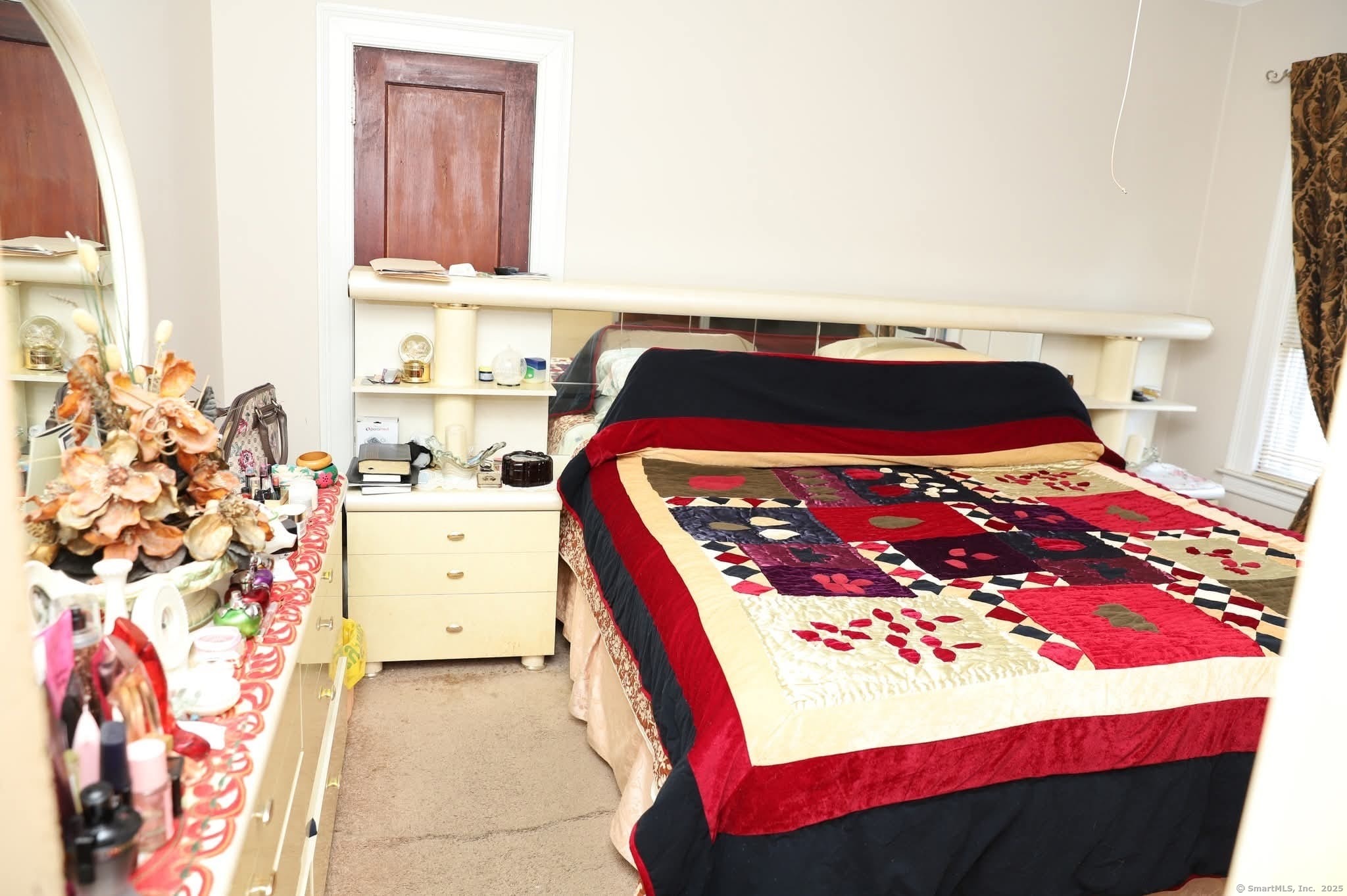 11 Pershing Street Hartford, CT 06112 - Photo 6 of 37 a bedroom with a bed and a dresser