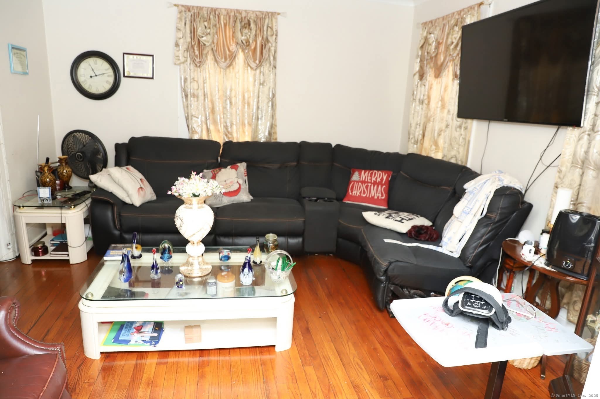 11 Pershing Street Hartford, CT 06112 - Photo 7 of 37 a living room with furniture and wooden floor