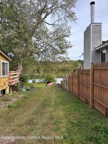 a kitchen that has a sink and a stove
