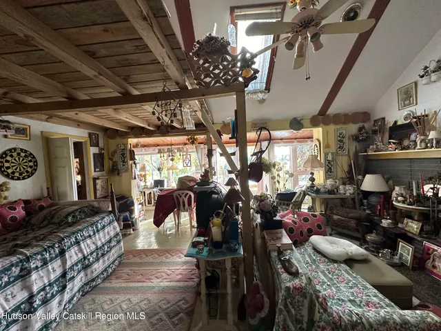 a kitchen with wooden cabinets and outdoor seating