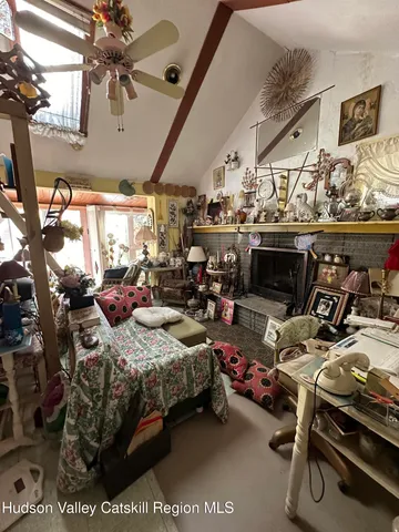 a backyard of a house with a table and chairs