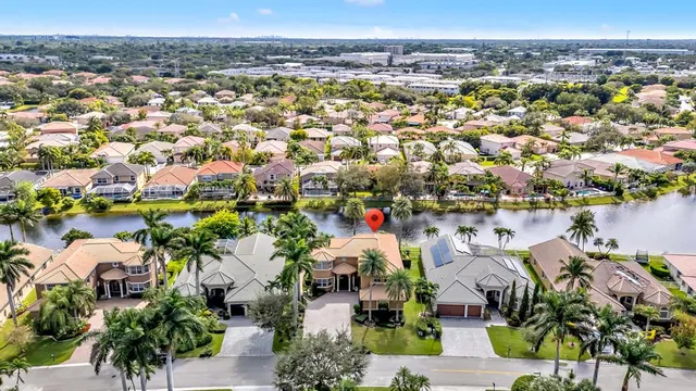 a dining room with furniture and entryway