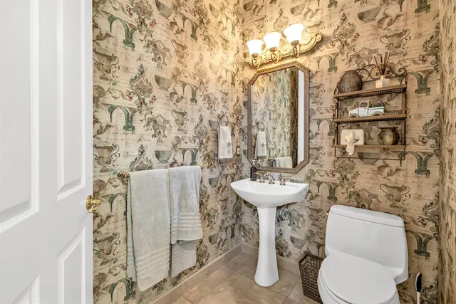 a kitchen with stainless steel appliances granite countertop a stove and a refrigerator