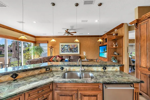 a view of swimming pool with chairs