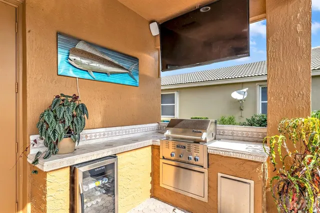 a bed room with a bed and a ceiling fan