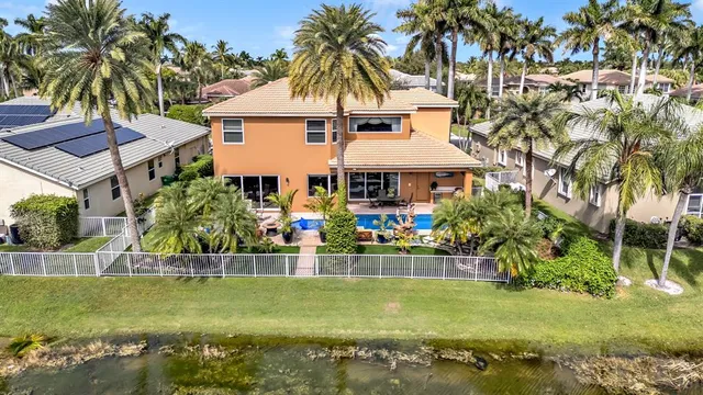 front view of a house with a swimming pool