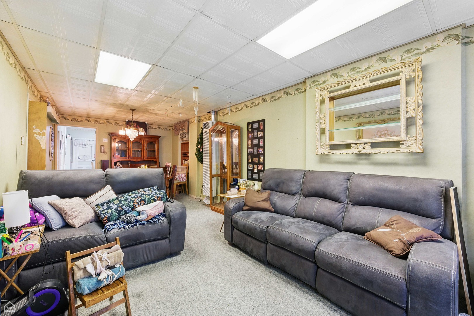 1448 West Taylor Street Chicago, IL 60607 - Photo 19 of 30 a living room with furniture and a large window