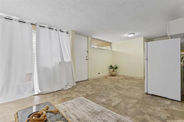 a view of a storage & utility room with a sink
