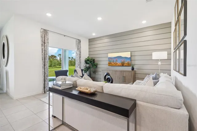 a room with furniture and a window