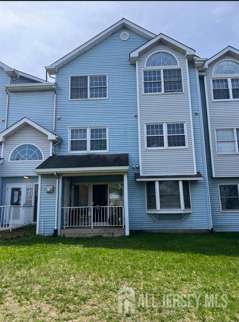 a view of front of a house with a yard