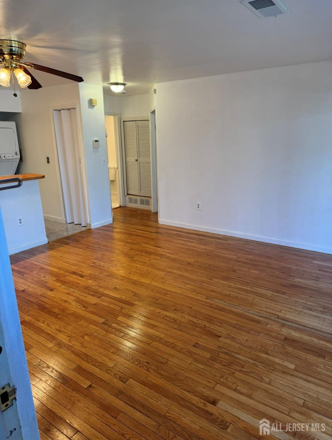 314 Edpas Road New Brunswick, NJ 08901 - Photo 3 of 8 a view of a room with wooden floor