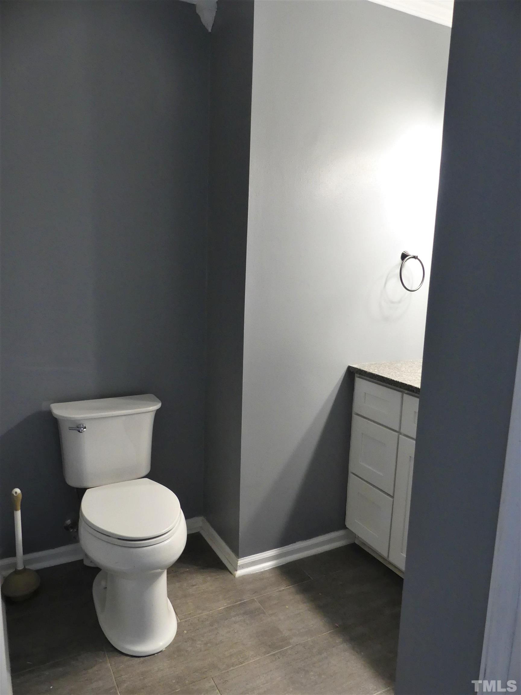 6520 English Oaks Drive Raleigh, NC 27615 - Photo 12 of 21 a bathroom with a toilet