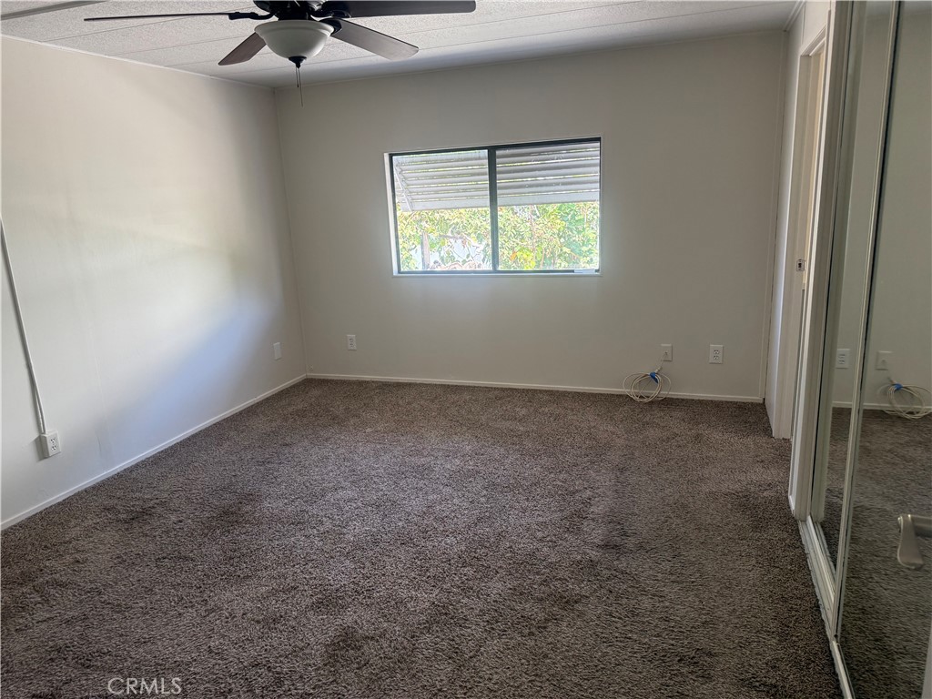 15181 Van Buren, Unit 256 Riverside, CA 92504 - Photo 19 of 34 an empty room with a window