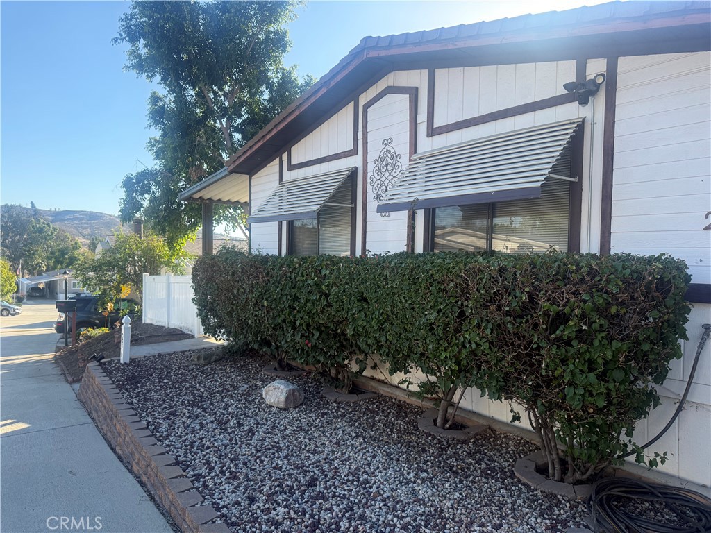 15181 Van Buren, Unit 256 Riverside, CA 92504 - Photo 2 of 34 a house view with a outdoor space