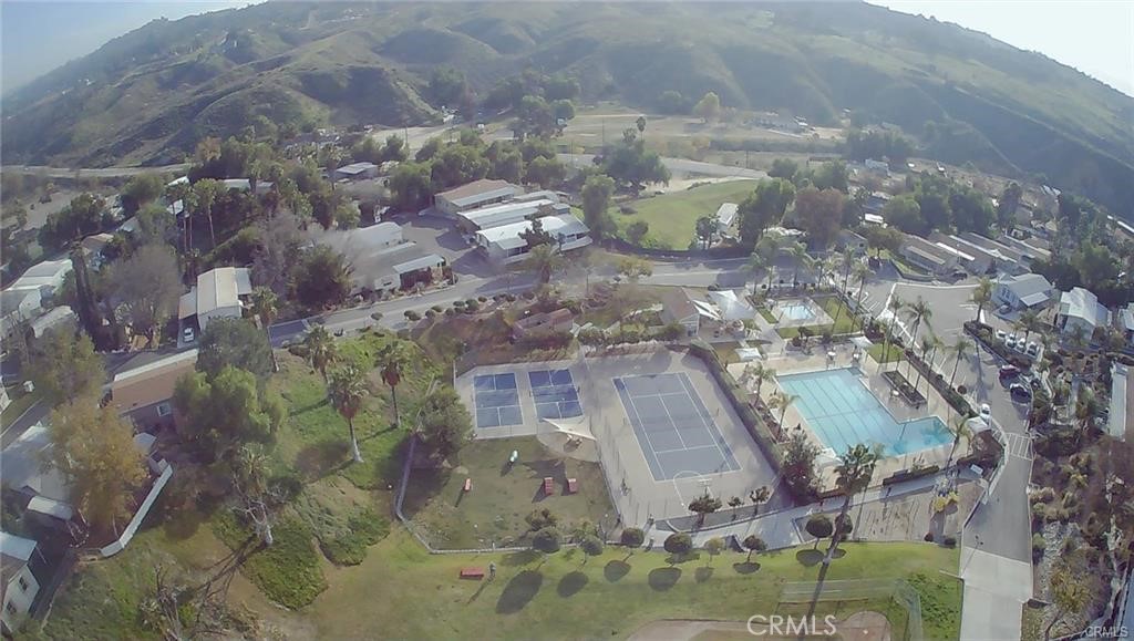 15181 Van Buren, Unit 256 Riverside, CA 92504 - Photo 22 of 34 a aerial view of a house with a yard
