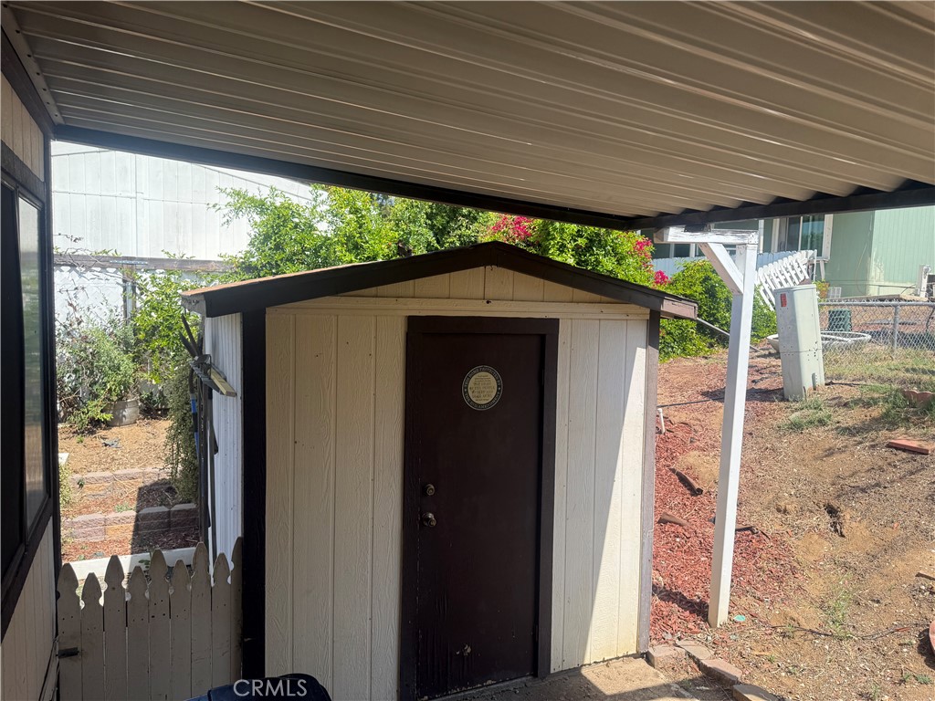 15181 Van Buren, Unit 256 Riverside, CA 92504 - Photo 3 of 34 a front view of a house with a large window