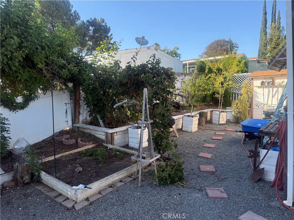 15181 Van Buren, Unit 256 Riverside, CA 92504 - Photo 6 of 34 a view of a backyard with sitting area
