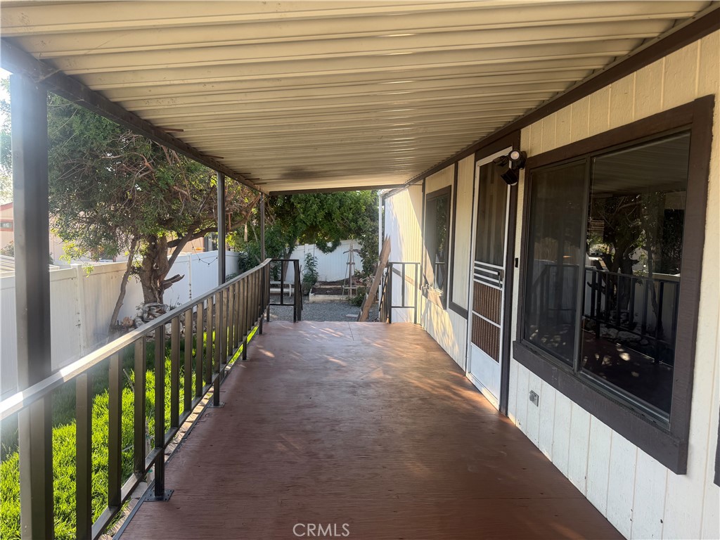 15181 Van Buren, Unit 256 Riverside, CA 92504 - Photo 8 of 34 a view of a porch