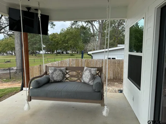 a view of wooden floor with a lake