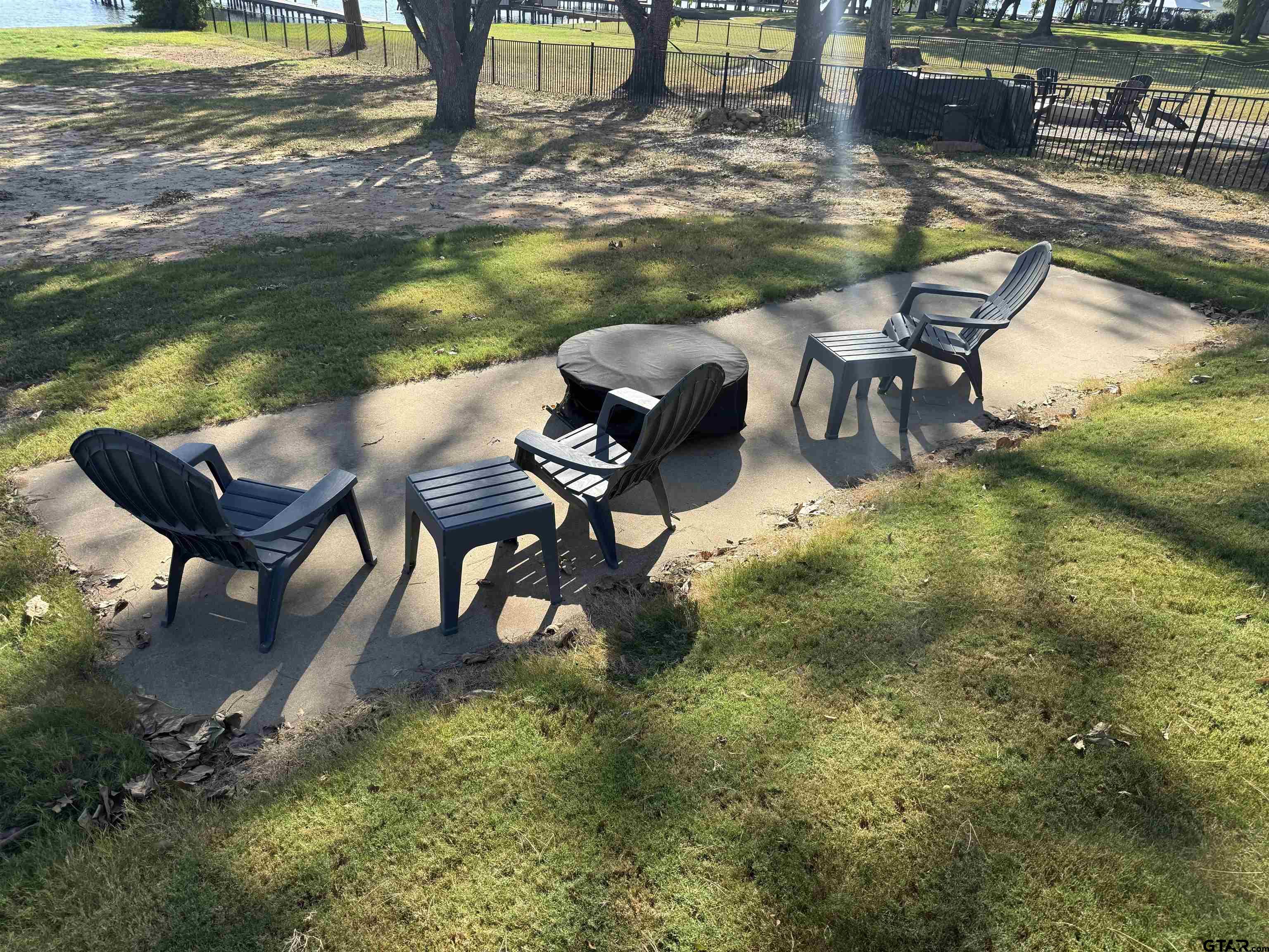 16093 County Road 189 West Flint, TX 75762 - Photo 14 of 46 a view of a lake with table and chairs