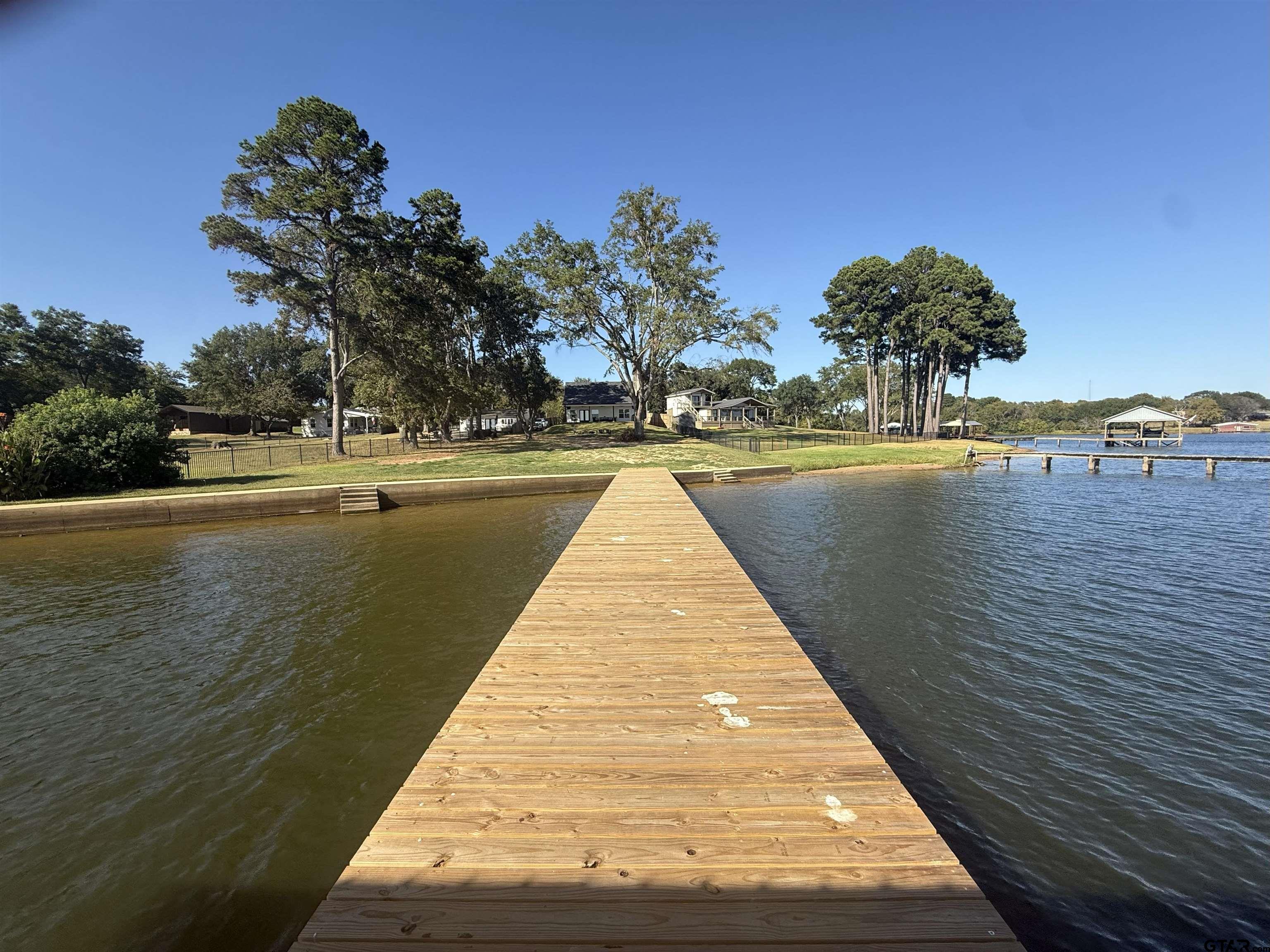 16093 County Road 189 West Flint, TX 75762 - Photo 16 of 46 a view of swimming pool with outdoor seating