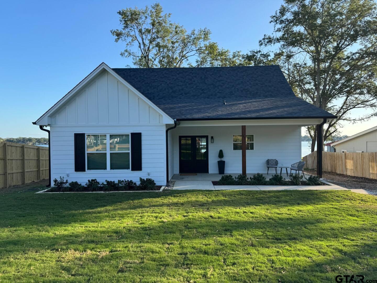 16093 County Road 189 West Flint, TX 75762 - Photo 2 of 46 a front view of a house with a yard