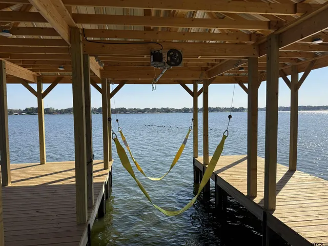 a view of a hallway with seating area