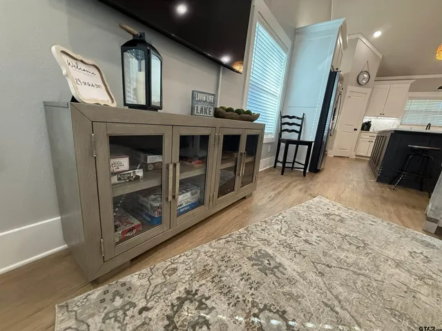 a bedroom with a bed and a walk in closet