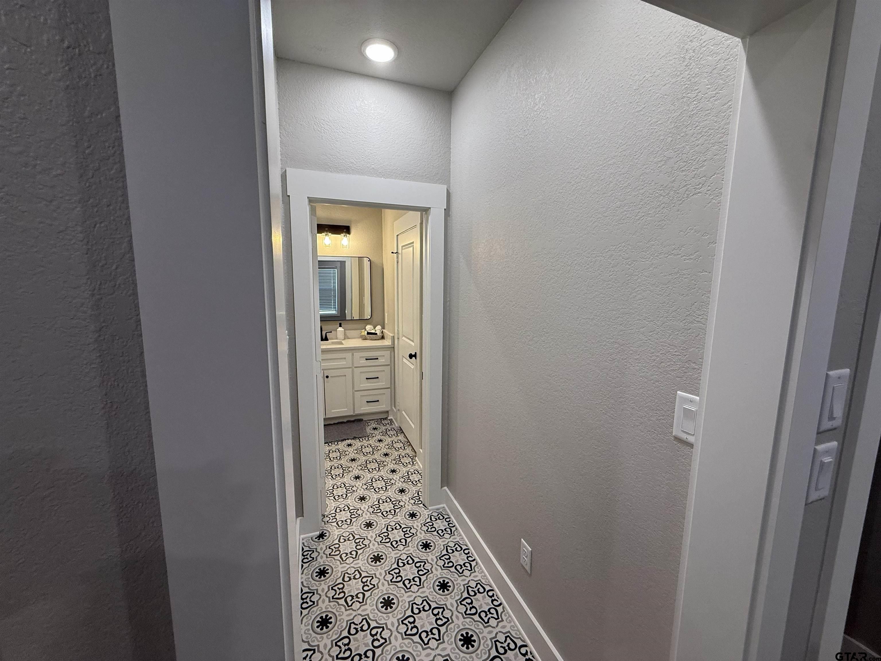 16093 County Road 189 West Flint, TX 75762 - Photo 34 of 46 a bathroom with a sink and a shower