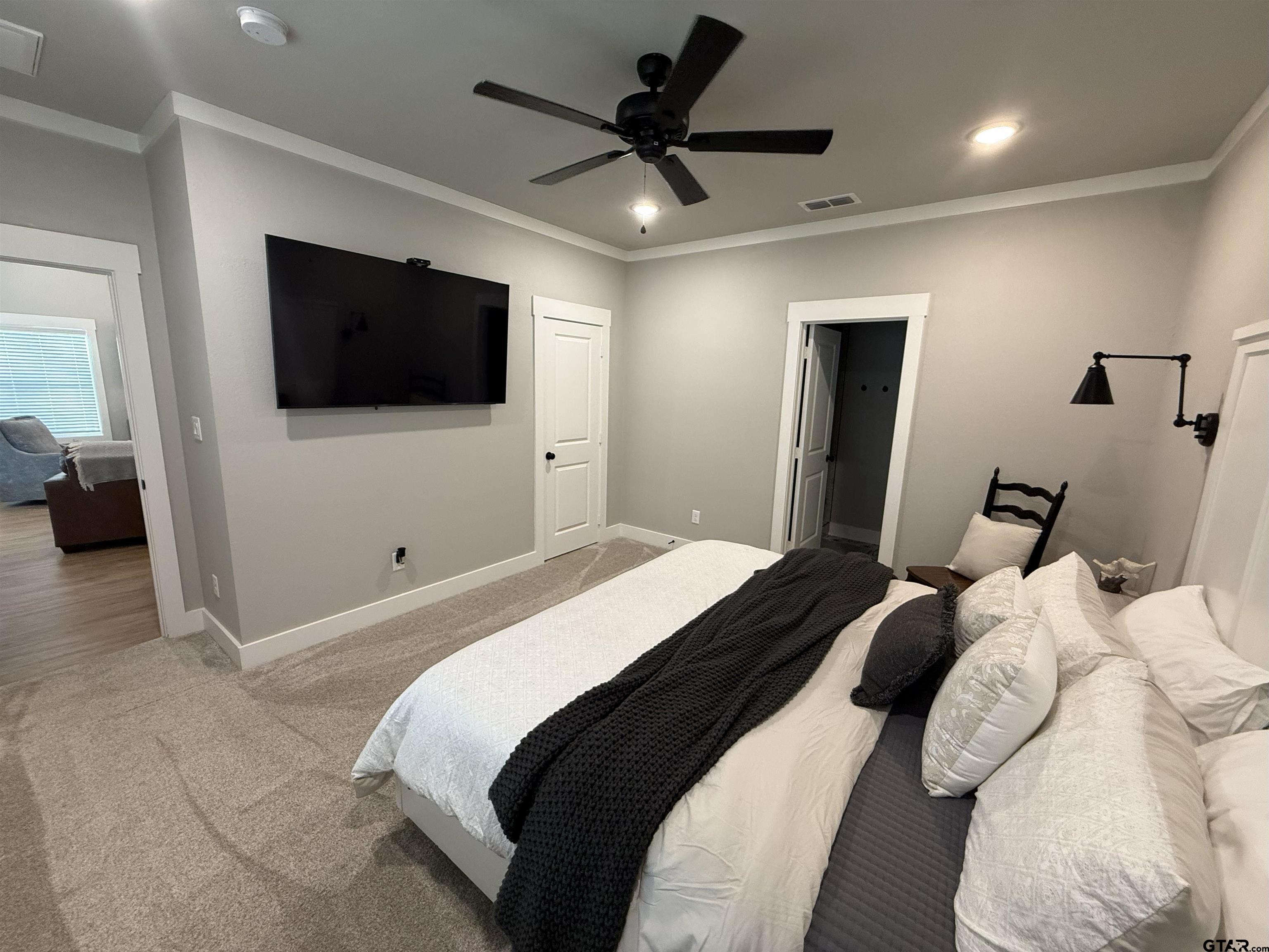 16093 County Road 189 West Flint, TX 75762 - Photo 39 of 46 a bedroom with a bed and a flat screen tv