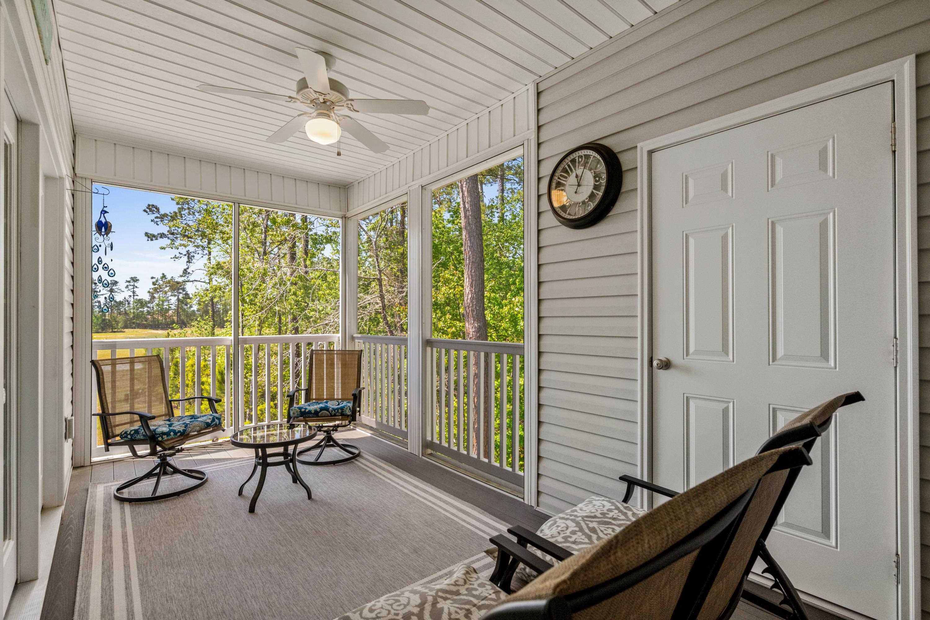 948 Jackline Place, Unit 201 Murrells Inlet, SC 29576 - Photo 19 of 37 Sunroom with a ceiling fan