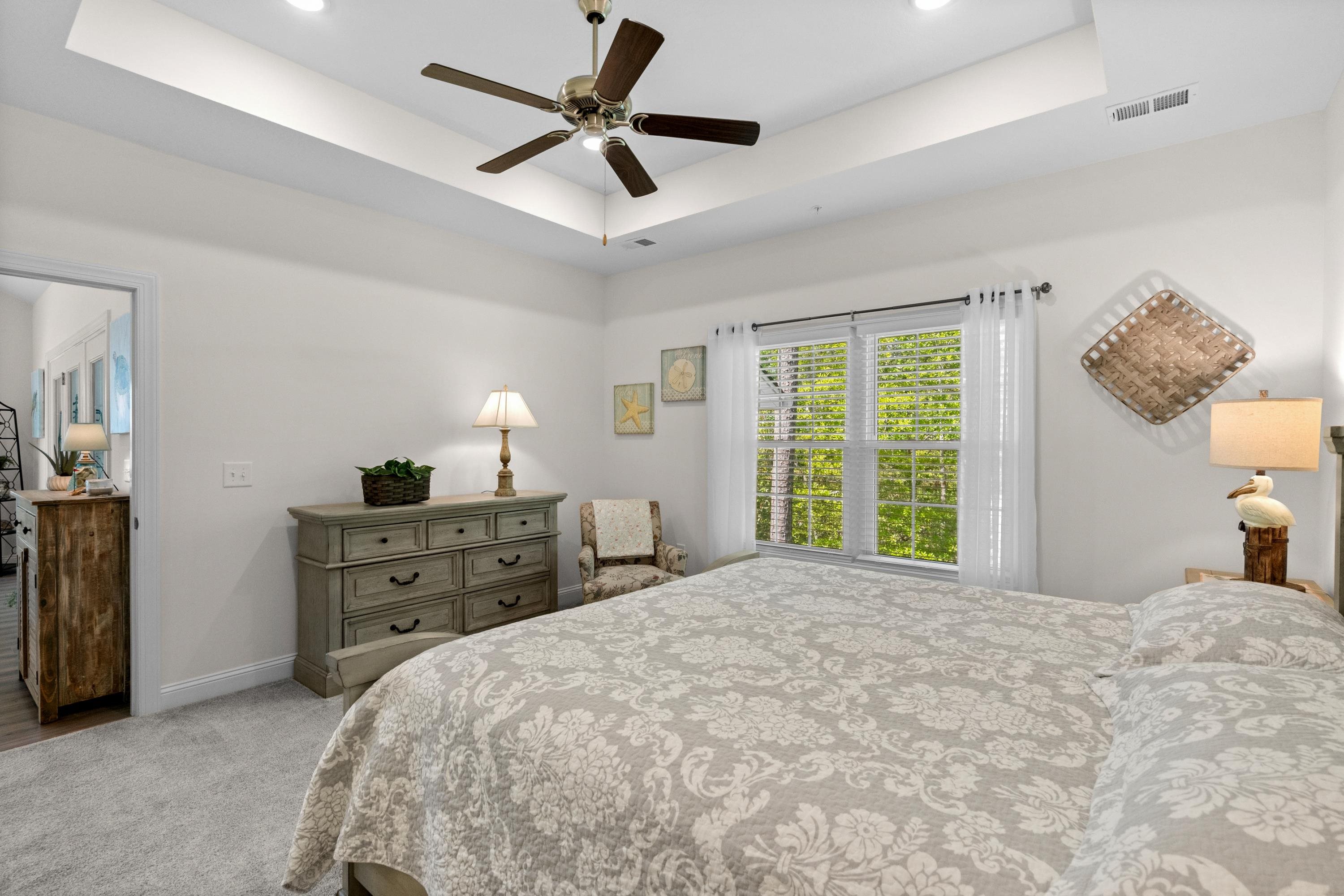 948 Jackline Place, Unit 201 Murrells Inlet, SC 29576 - Photo 22 of 37 Carpeted bedroom featuring a ceiling fan, a raised ceiling, and recessed lighting
