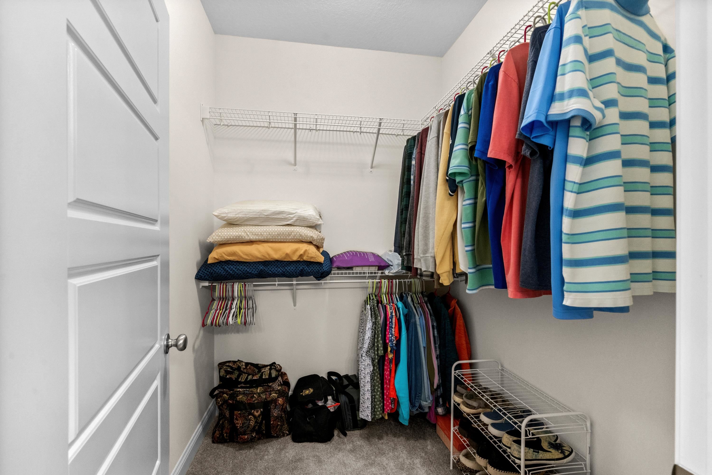 948 Jackline Place, Unit 201 Murrells Inlet, SC 29576 - Photo 24 of 37 Walk in closet with light colored carpet
