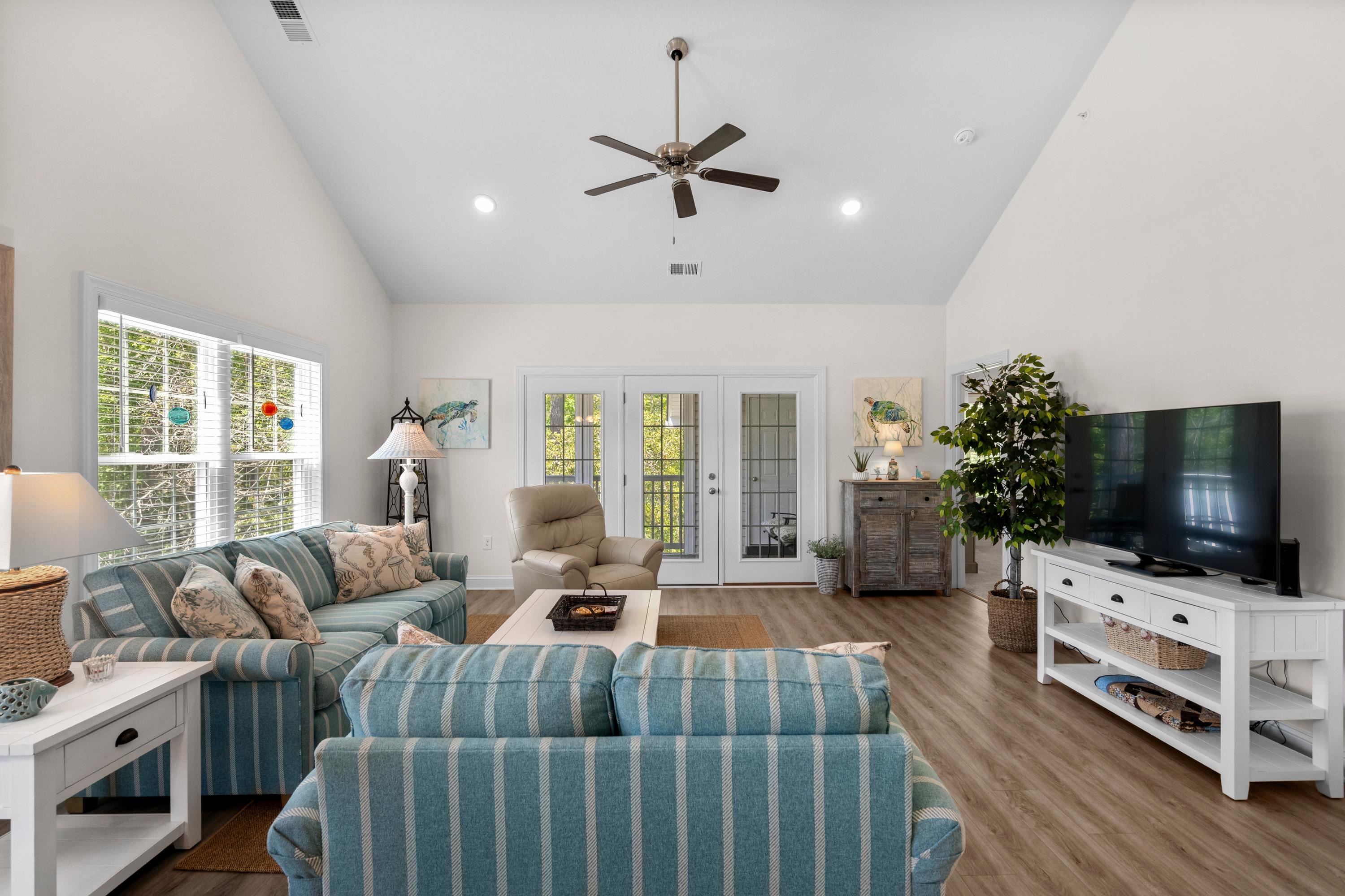 948 Jackline Place, Unit 201 Murrells Inlet, SC 29576 - Photo 6 of 37 Living room with high vaulted ceiling, wood finished floors, healthy amount of natural light, a ceiling fan, and recessed lighting