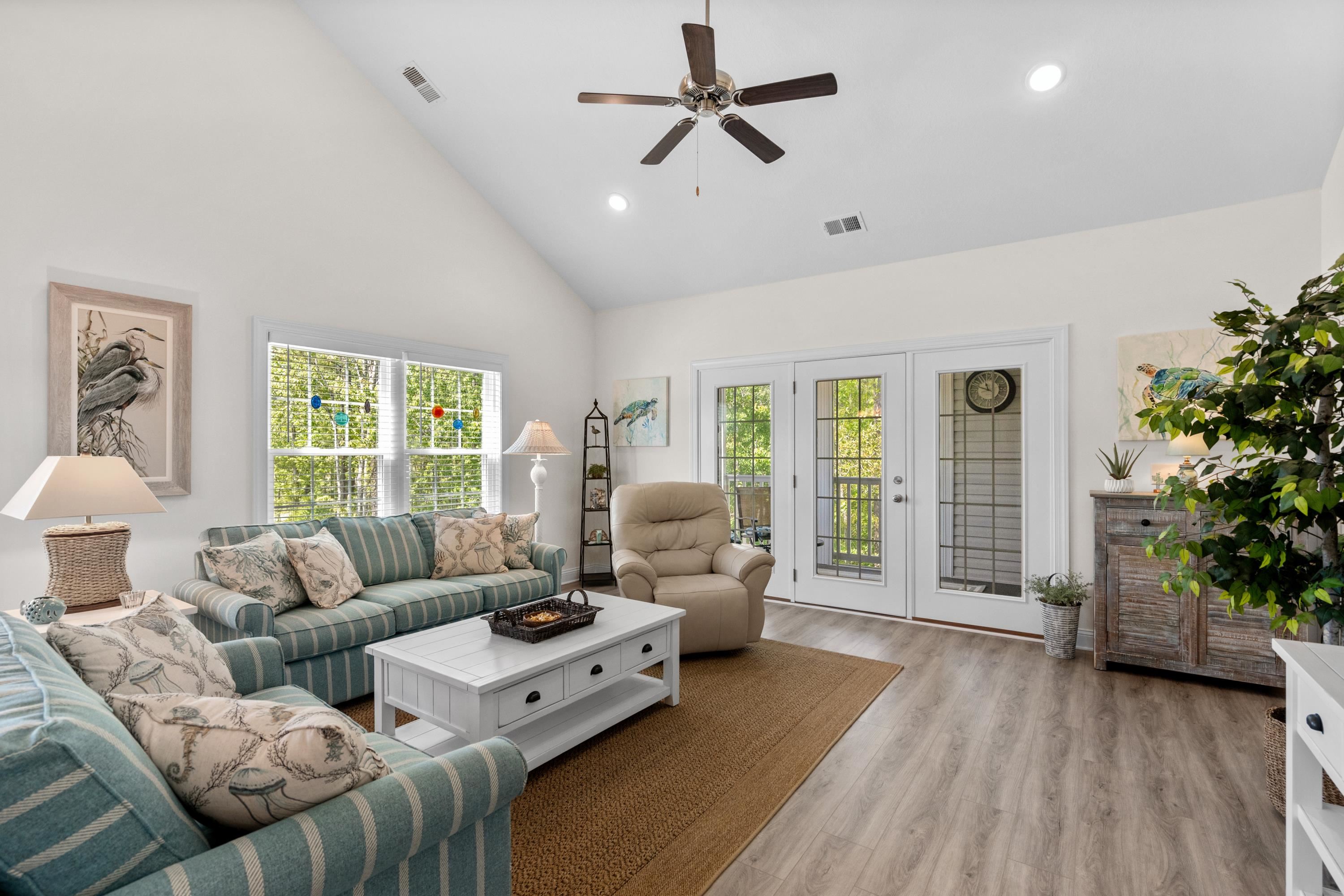 948 Jackline Place, Unit 201 Murrells Inlet, SC 29576 - Photo 8 of 37 Living room with high vaulted ceiling, french doors, light wood finished floors, plenty of natural light, and ceiling fan