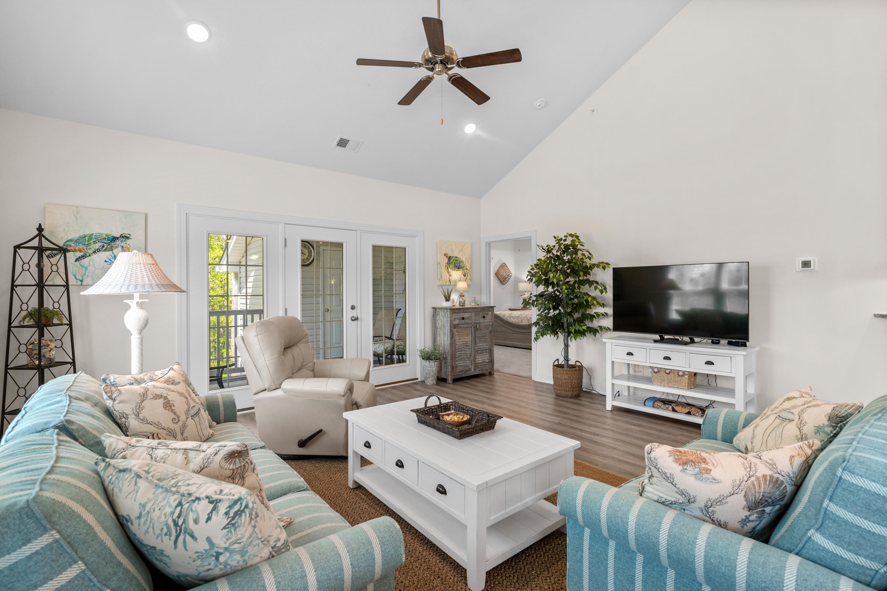 948 Jackline Place, Unit 201 Murrells Inlet, SC 29576 - Photo 9 of 37 Living room with wood finished floors, recessed lighting, high vaulted ceiling, french doors, and a ceiling fan