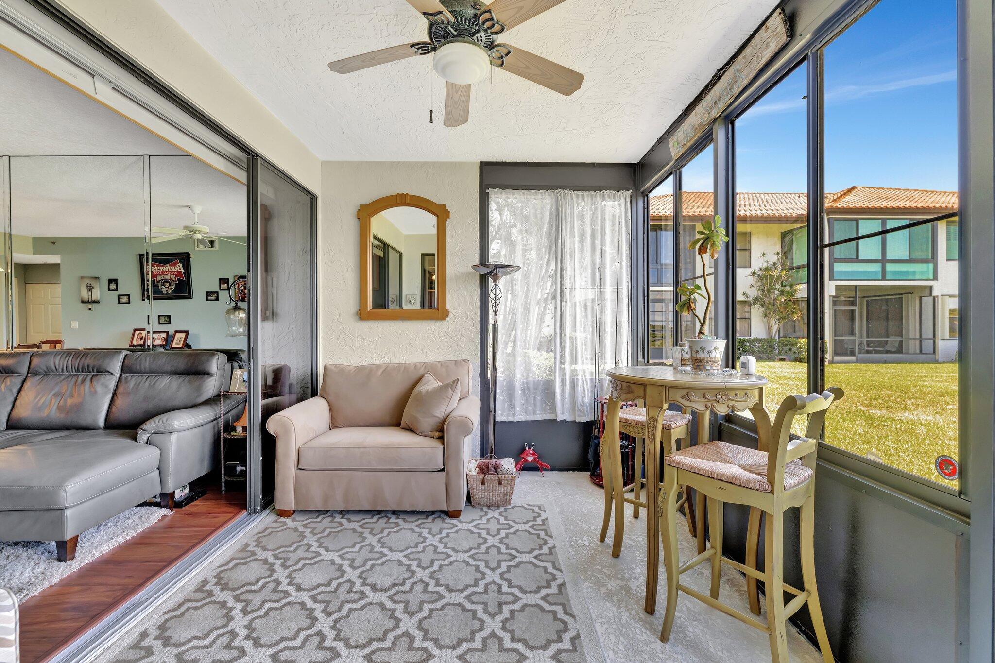 6062 Southeast Landing Way, Unit 2 Stuart, FL 34997 - Photo 13 of 36 Sun Room