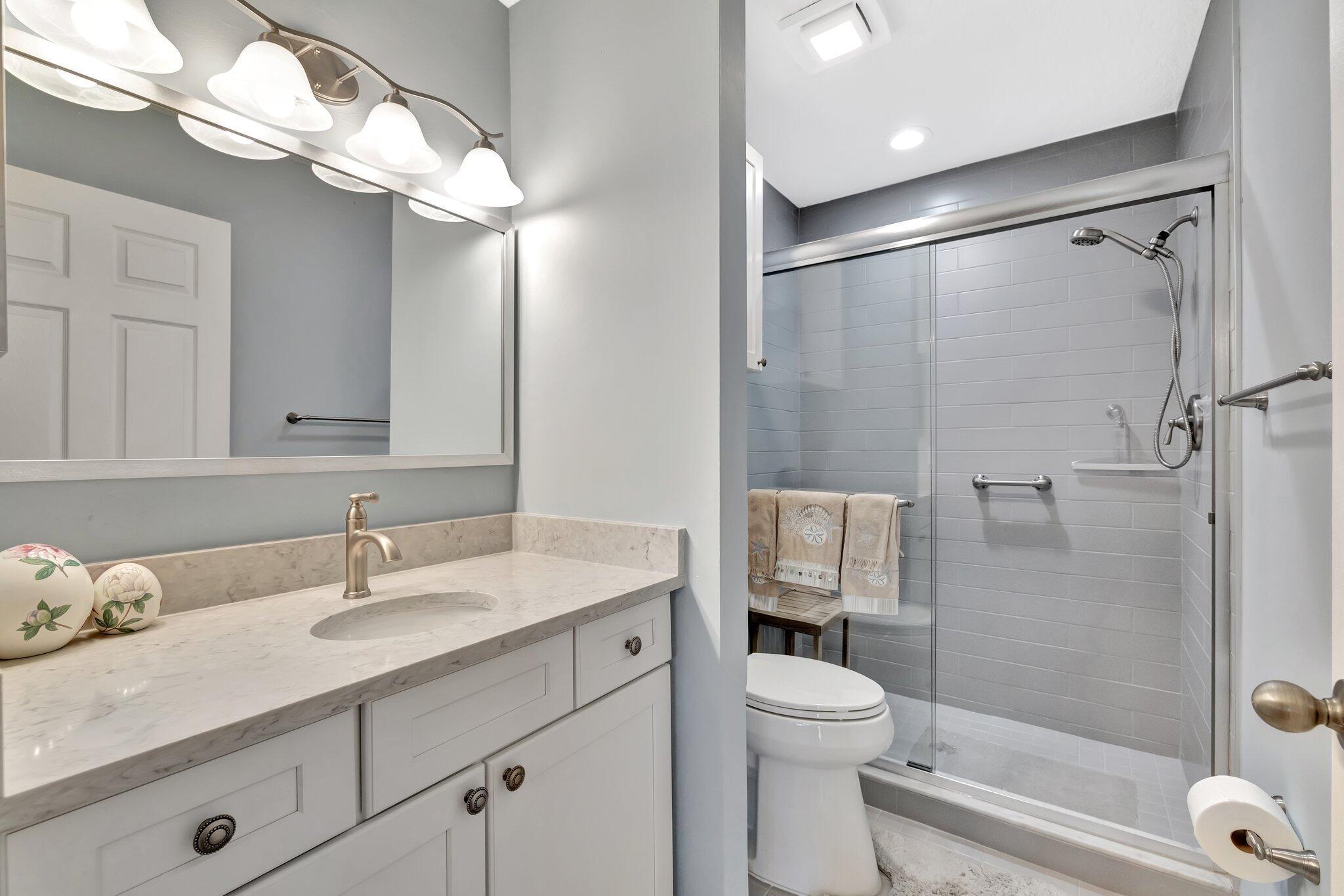 6062 Southeast Landing Way, Unit 2 Stuart, FL 34997 - Photo 19 of 36 Primary Bath