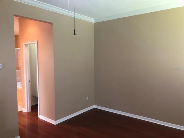 a view of small space with wooden floor