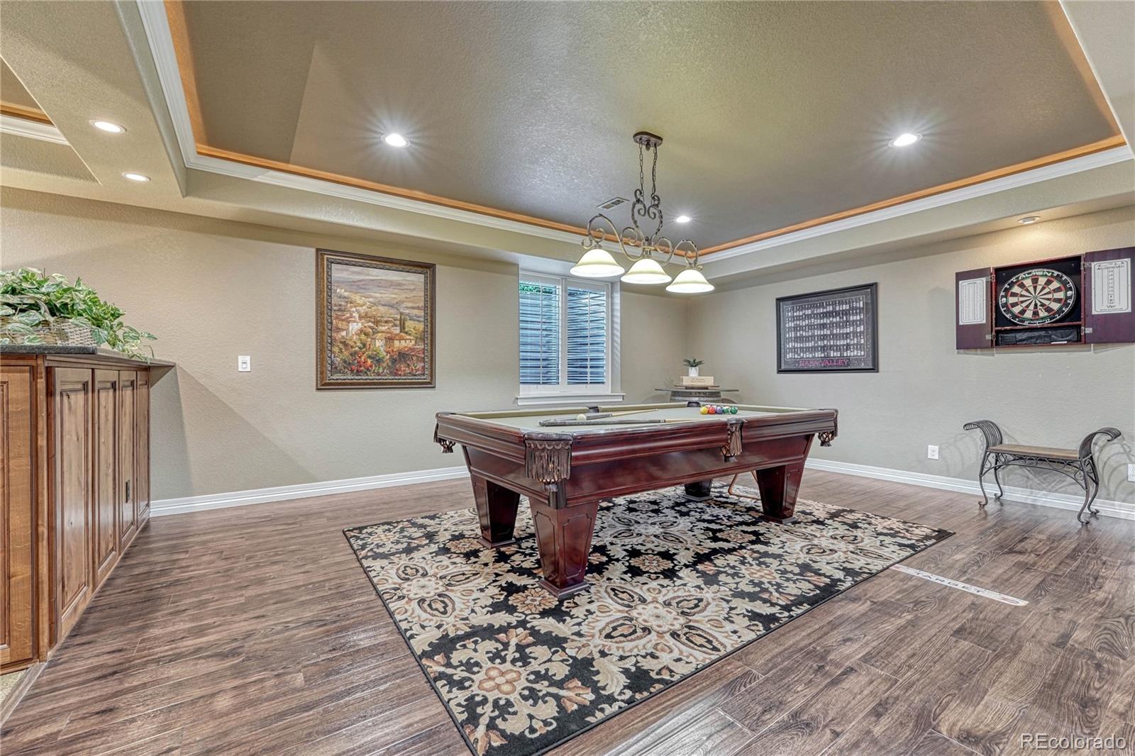 20125 East Shady Ridge Road Parker, CO 80134 - Photo 26 of 40 a room with furniture pool table and window