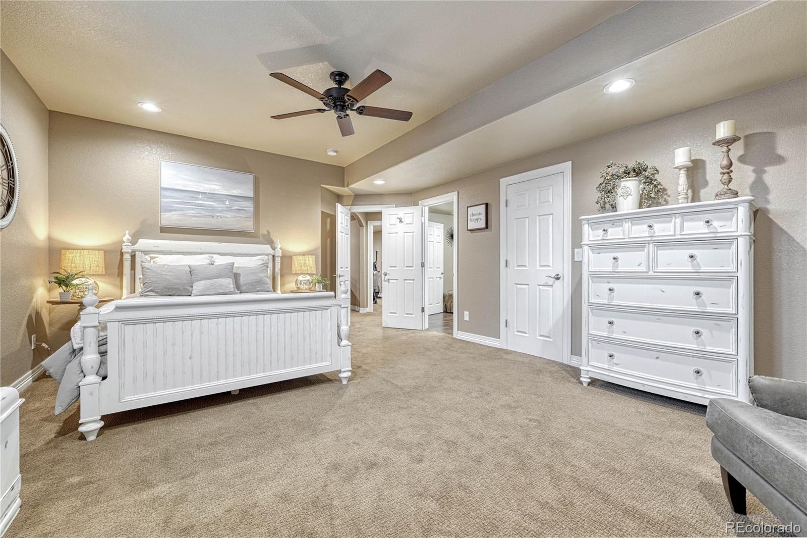 20125 East Shady Ridge Road Parker, CO 80134 - Photo 30 of 40 a room with a bed and furniture