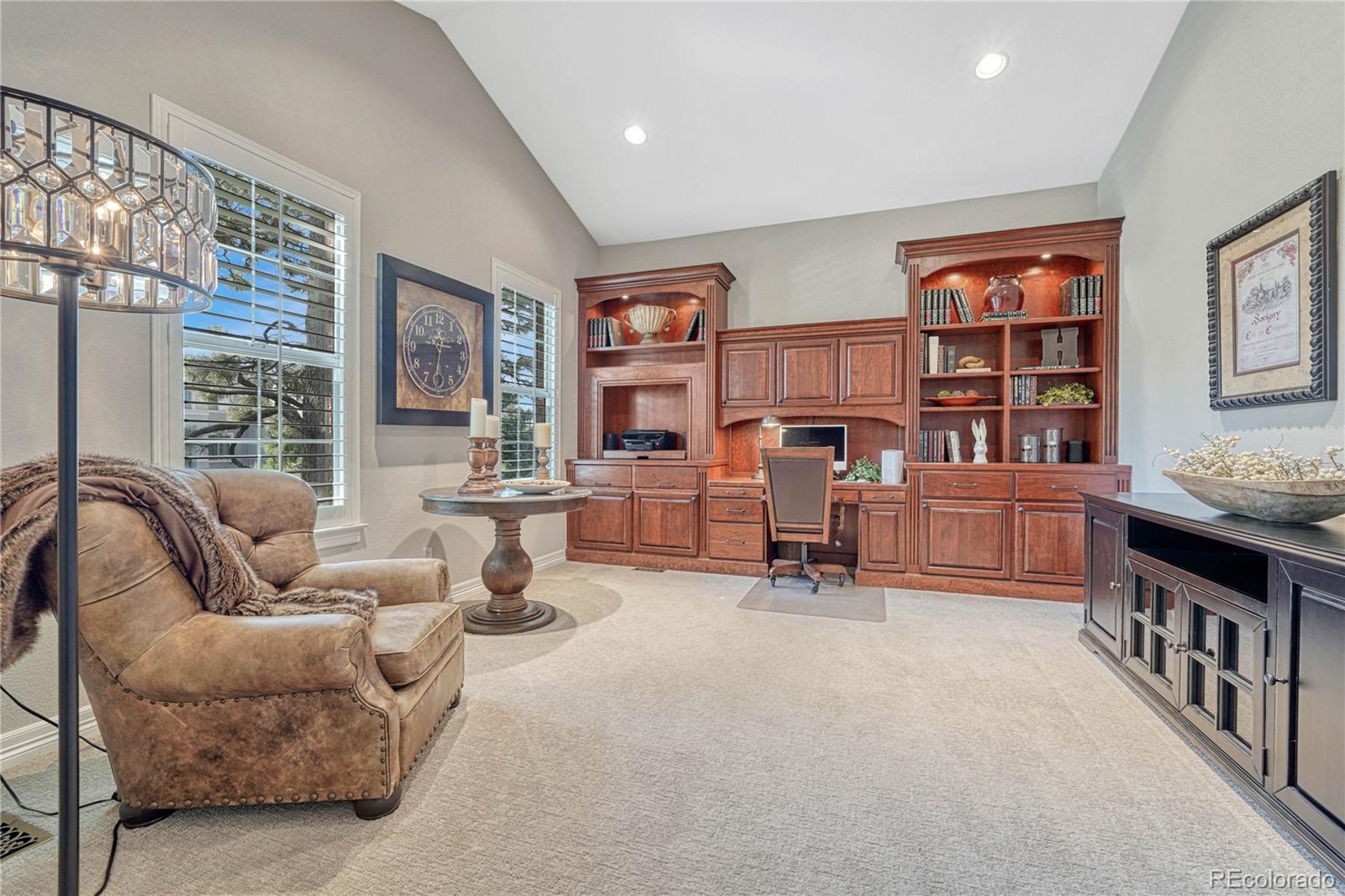 20125 East Shady Ridge Road Parker, CO 80134 - Photo 10 of 40 a living room with furniture and large windows