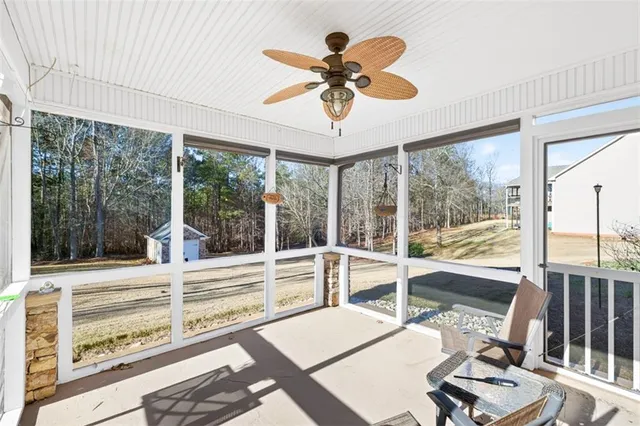 a view of a house with a snow on the road